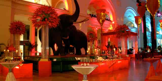 Elegant event space at The Art Institute of Chicago with elephant centerpiece and upscale decor.