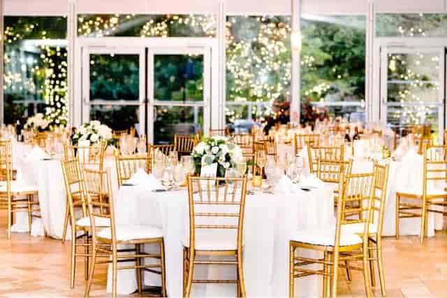 Elegant banquet space at Galleria Marchetti with floral centerpieces for weddings and galas.