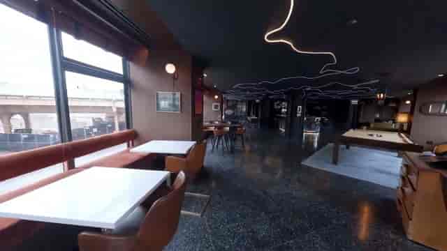 Clever Coyote at The Robey: modern event space with natural light for networking and gatherings.