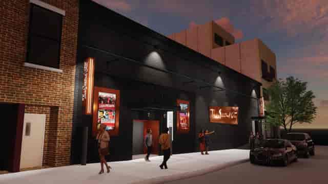 Modern theater venue with sleek exterior, perfect for concerts and corporate events.