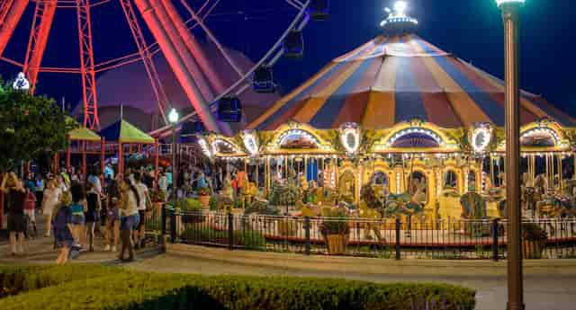 Vibrant amusement center at Navy Pier with colorful carousel for festive events.