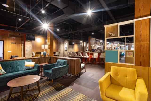 Modern event space at iO Theater with stylish decor, perfect for workshops and networking.
