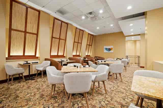 Conference center at Crowne Plaza Houston with natural light, ideal for meetings and networking.