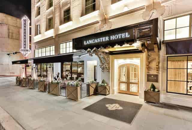 Elegant entrance of The Lancaster Hotel, perfect for upscale events and meetings.