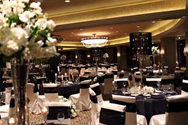 Elegant Bluebonnet Ballroom with navy linens, ideal for weddings and upscale events.