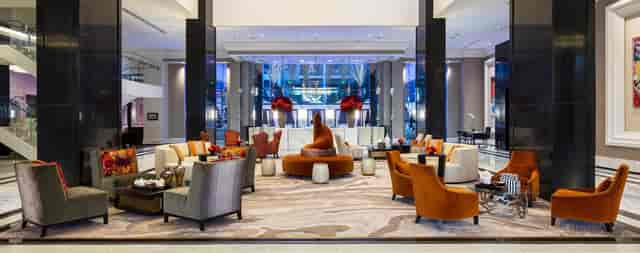 Post Oak Room at Willie G's: modern hotel lobby with vibrant decor for events and meetings.