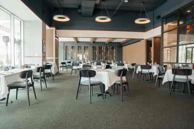 Private Events Area at Masraff's with elegant tables for gatherings and networking.