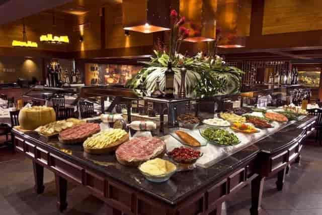 Elegant buffet setup at Fogo de Chão, perfect for events and meetings.
