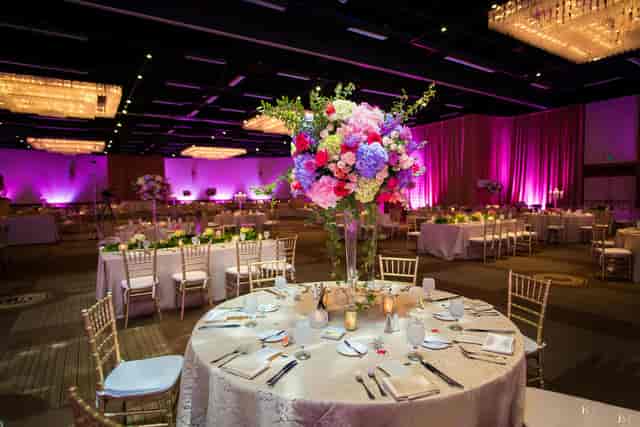 Elegant banquet hall with floral centerpieces for upscale weddings and corporate events.