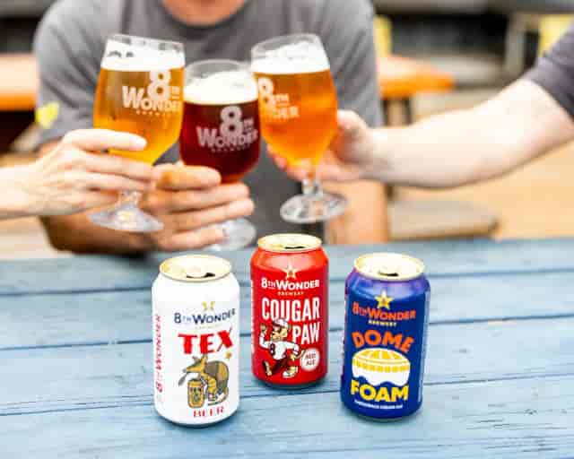 Brewery taproom with colorful beer cans, ideal for networking and team-building events.