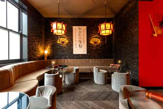 Stylish Shanghai Cocktail Lounge with plush seating, perfect for networking events.