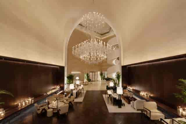 Luxurious Dubai EDITION Studio 3 venue with elegant chandeliers for corporate events.