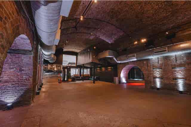 Industrial Rivington St event space, exposed brick, brand activation