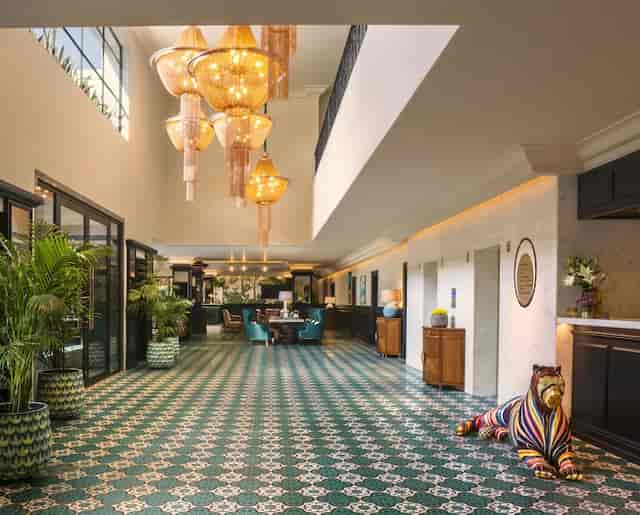 Stylish hotel lobby at The Connaught with elegant chandeliers, ideal for events.