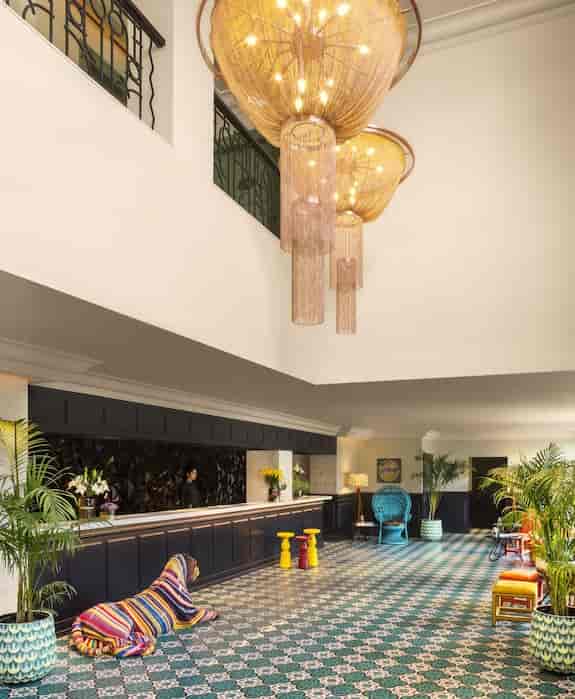 Vibrant hotel lobby at The Connaught, ideal for events and networking with colorful decor.