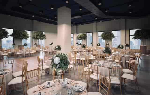 Elegant ballroom with round tables, perfect for events and gatherings.