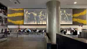David Rubenstein Atrium at Lincoln Center, modern event space with vibrant mural, networking venue.