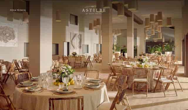 Elegant event space at Finca Astilbe with round tables, ideal for weddings and corporate events.