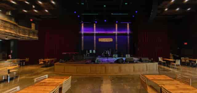 Mezzanine Level at City Winery: spacious event space with vibrant lighting for concerts.