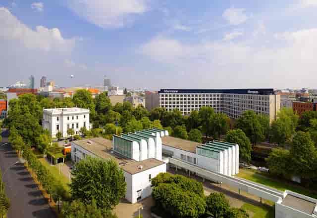 Diverse event venue at Sheraton Berlin, blending modern design with historical charm.