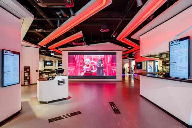 Red Bull Lounge in Berlin: modern event space with vibrant lighting for meetings and launches.