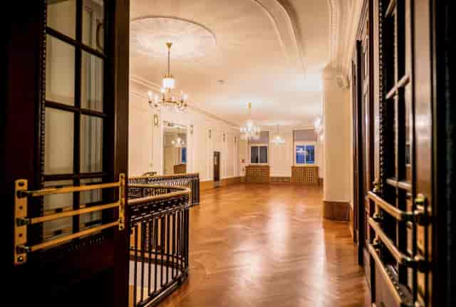 Elegant Wandelhalle Meistersaal venue with chandeliers for corporate events and gatherings.