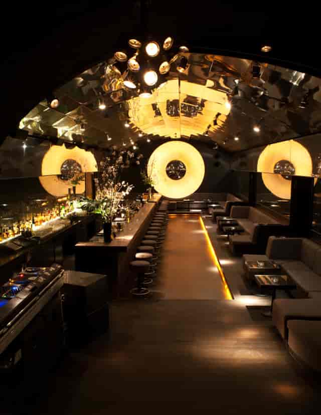 Sleek modern bar at Bar Tausend, ideal for upscale events and mixers.