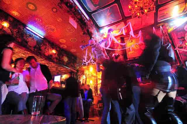 Vibrant Kumpelnest 3000 pub, colorful lighting, ideal for networking events and socials.