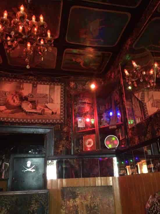 "Unique Kumpelnest 3000 pub with vintage art, ideal for intimate themed events."