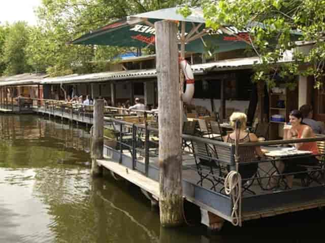 Charming waterfront restaurant in Berlin for team-building retreats and intimate events.