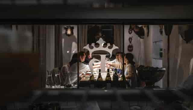 Private dining setup in Kong Hans Kælder for exclusive corporate dinners or events.