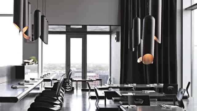 Sushi Suiten dining area with elegant lighting, perfect for events and gatherings.