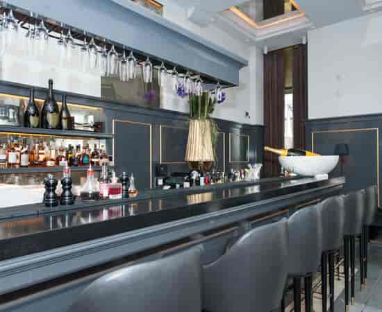 Elegant bar at D'Angleterre, ideal for networking events and cocktail receptions.