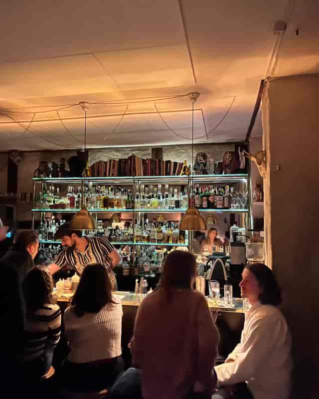 Lively Balderdash bar with ambient lighting for networking events and receptions.