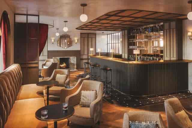 Elegant hotel bar with plush seating, ideal for networking and private receptions.