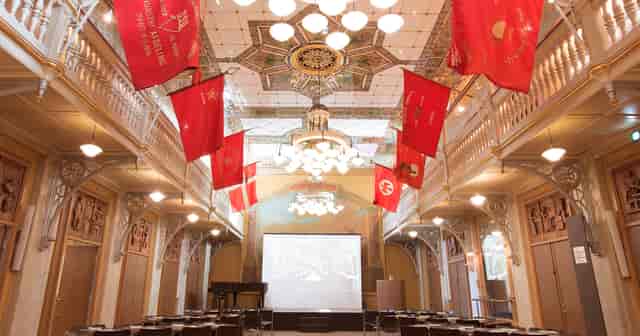 Elegant event space in Museum of Copenhagen with ornate ceiling, perfect for corporate meetings.