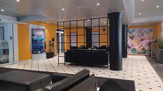 Modern event space at CABINN Aalborg, perfect for receptions and meetings.