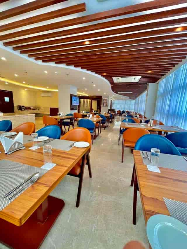 Modern meeting room with natural light at Best Western Maharani Bagh for events.