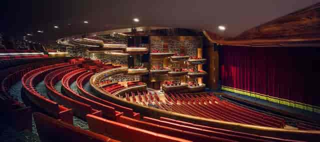 "Dubai Opera Main Auditorium with tiered seating for conferences and performances"