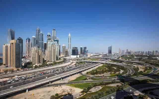 Jebel Ali skyline with skyscrapers, ideal for Dubai conferences and corporate events.