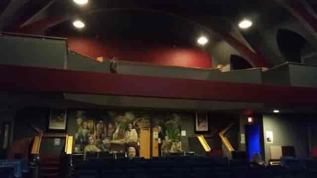 Brattle Theatre auditorium with tiered seating, ideal for conferences and performances.