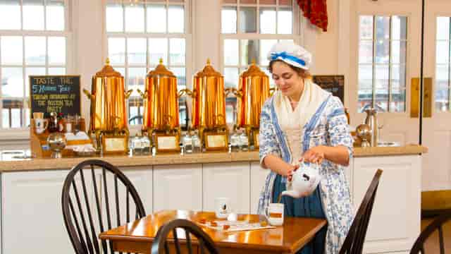 Historic tea event at Abigail’s Tea Room with elegant copper urns and charming ambiance.