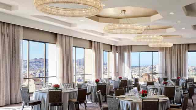 Grand Ballroom in SF Bold with elegant round tables for weddings and corporate events.