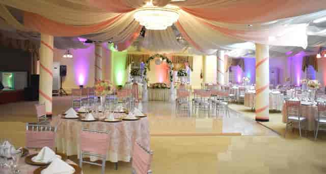 Large Banquet Hall with elegant draped ceilings, ideal for events and gatherings.