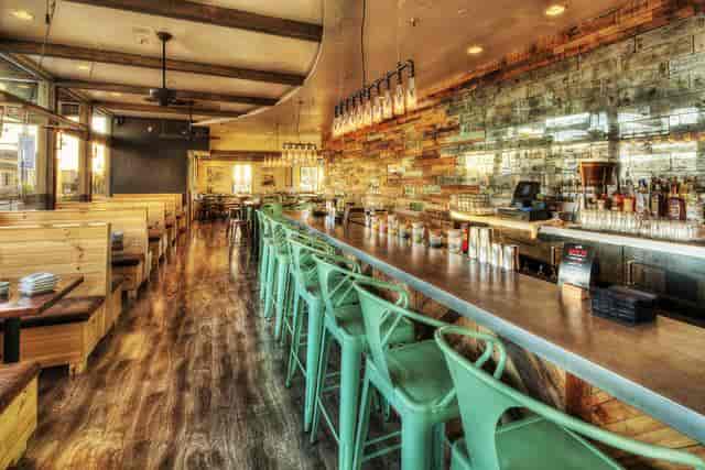 Chesterfield Lounge interior with wood accents, perfect for casual gatherings and networking events.