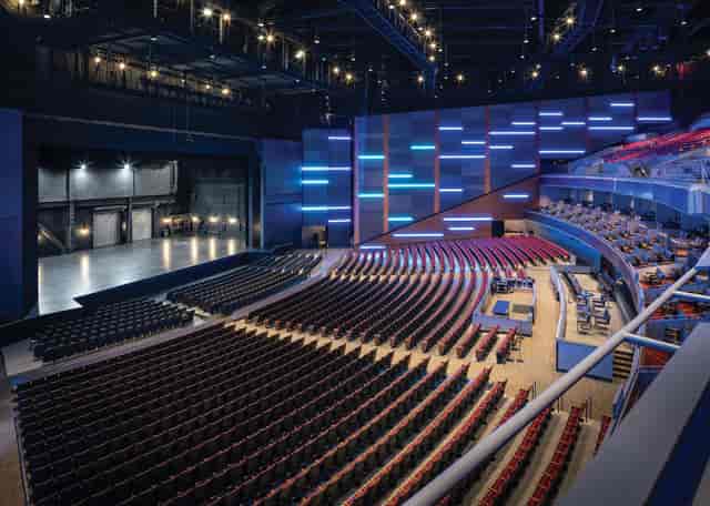 Modern Sugar Land Auditorium with tiered seating for versatile events.