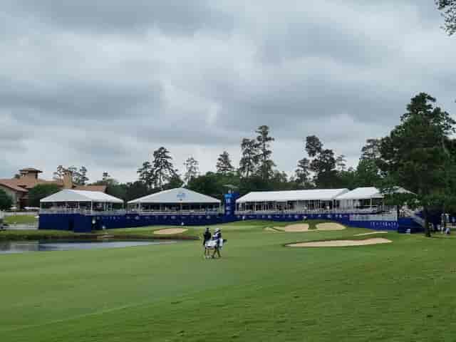 Jack Nicklaus Course outdoor event setup with white tents near a golf course.