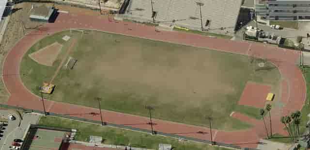Stadium at Jesse Owens: versatile sports field with running track for events and activities