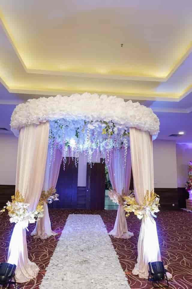 Elegant wedding altar with floral canopy at Crystal Ballroom, perfect for romantic ceremonies.