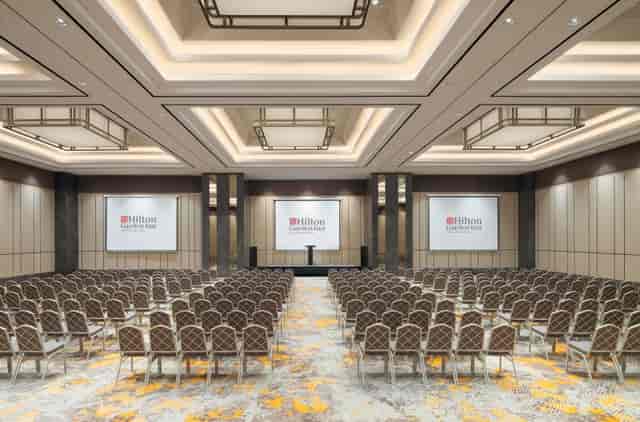 Meeting Room for large events with rows of chairs, ideal for presentations and seminars.